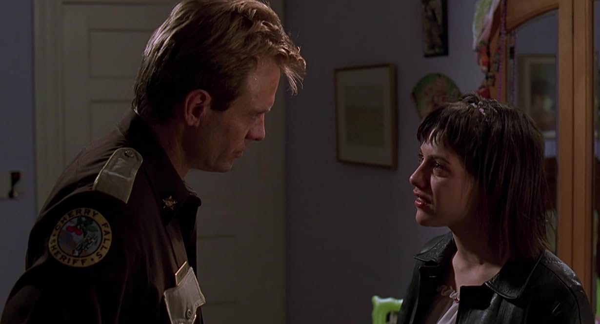 AXES, CLEAVERS AND BADGES: PORTRAYALS OF THE POLICE IN SLASHER FILMS